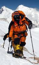 Adele Pennington approaching Makalu summit, PHD Omega Down Suit