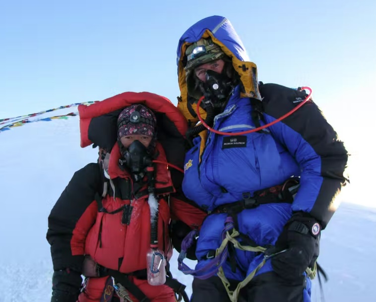 Sir Ranulph Fiennes and his Sherpa climbing partner on the summit of Mt Everest