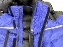 Jacket showed flared over-baffle (to protect water drips from oxygen-mask freezing on zip)