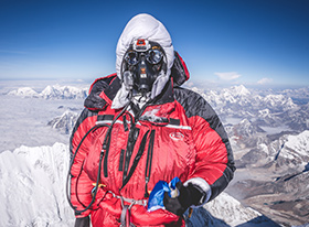Steve Davies in PHD Double Down Suit on the top of Everest